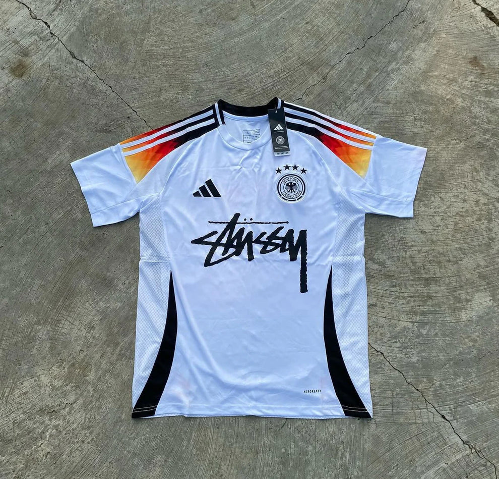 STUSSY X “GERMANY” JERSEY - WHITE