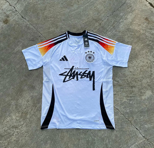 STUSSY X “GERMANY” JERSEY - WHITE